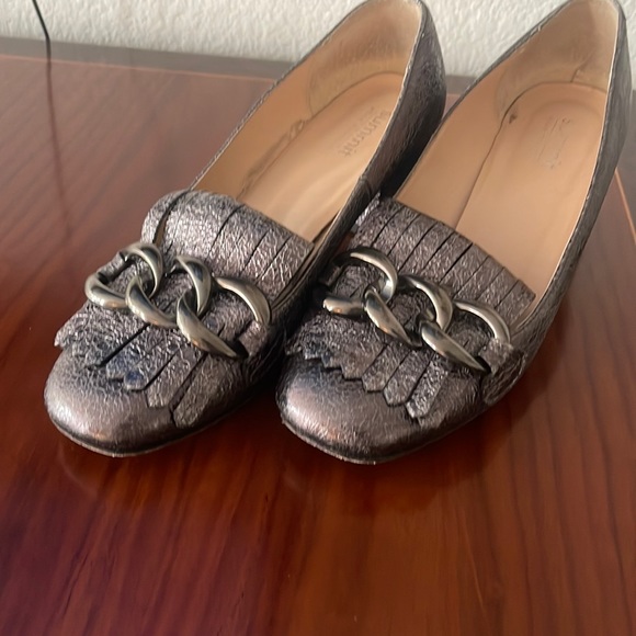 Loafers with a 1” heel and decorative chain across the toe. Worn once. - Picture 1 of 3
